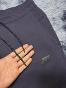Conjunto Nike tech fleece grey pink